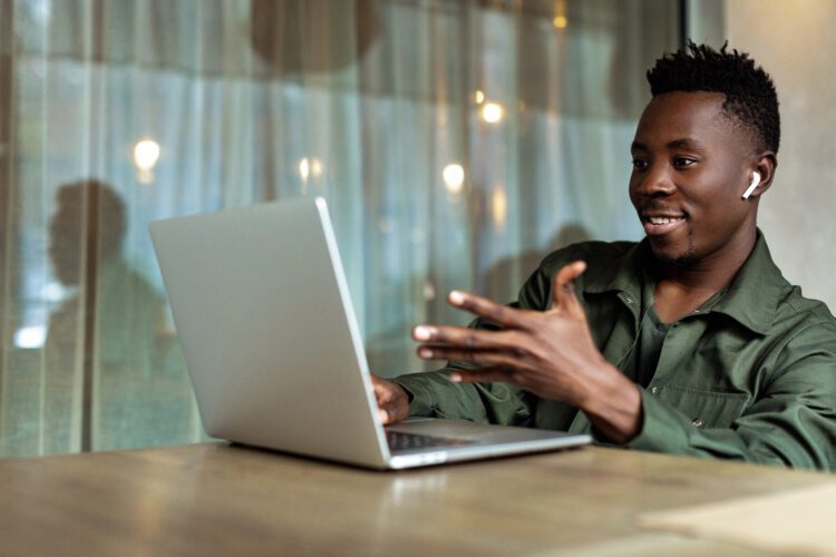 African American Man Using Computer