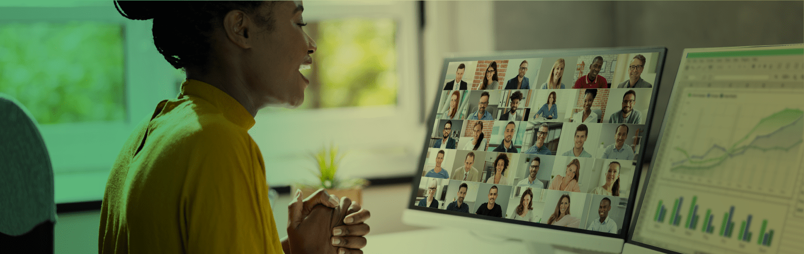 person smiling in a video group chat on one screen and performance data on the second screen